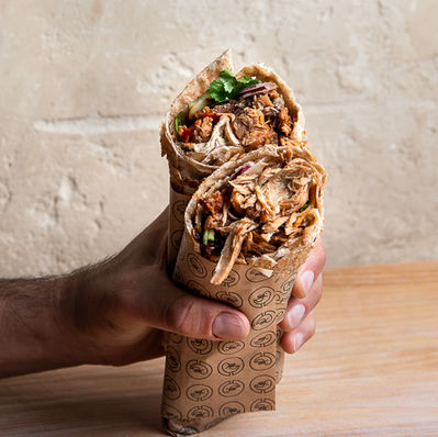 Pulled pork cooked overnight in Lebanese Saj Wrap